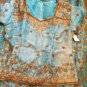 Blue Lehenga and Choli Top with Net overlay